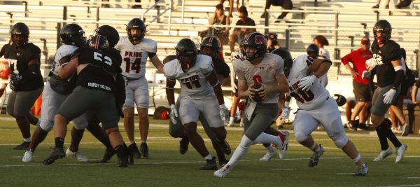 Varsity Football scrimmages on Aug 22. 