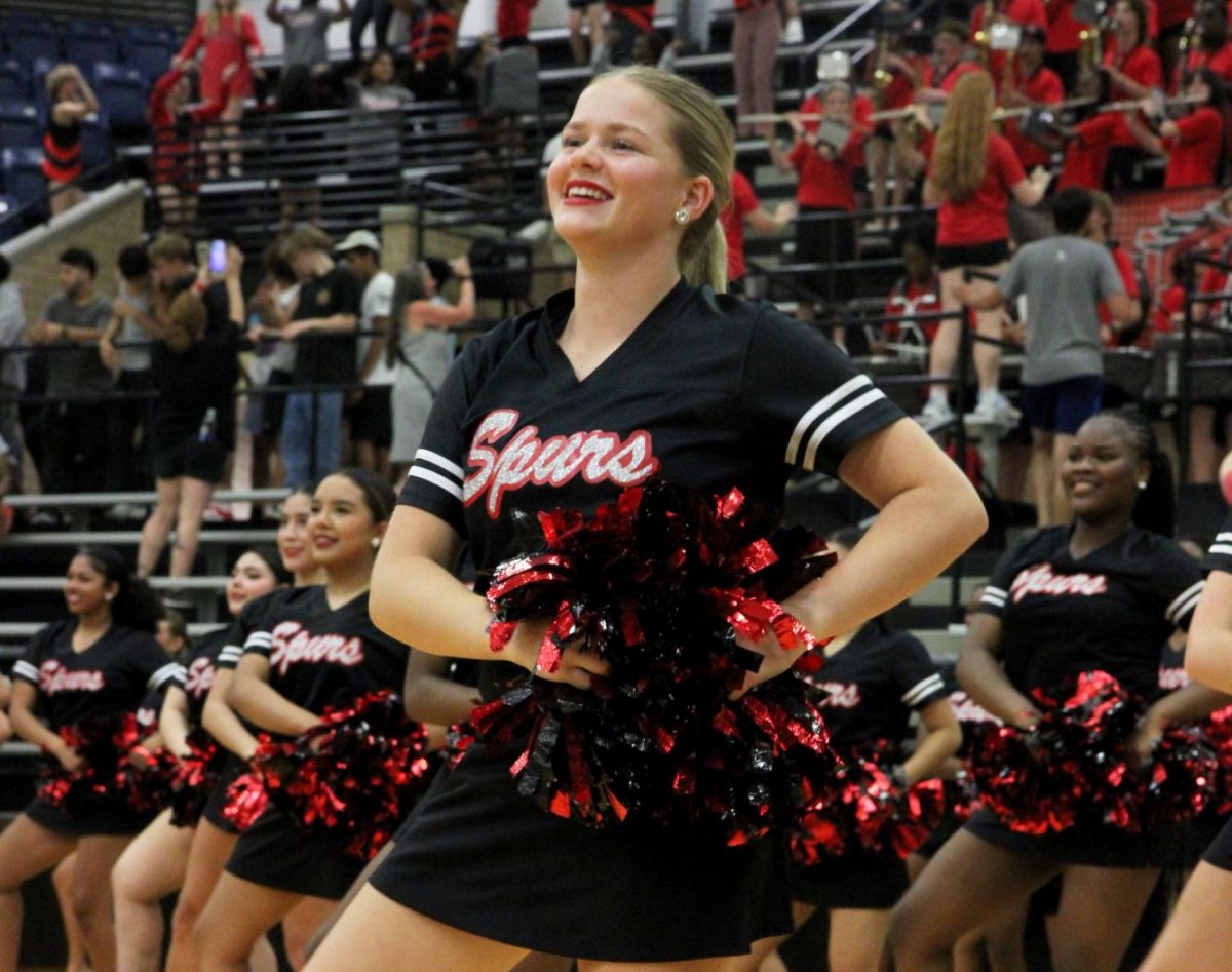 Emma Beaudine, 11, dances with the Silver Spurs at Meet the Broncos on Aug. 8.