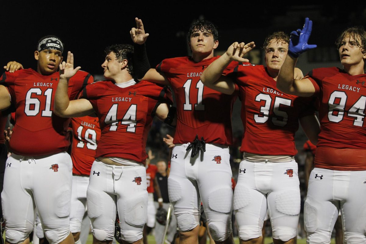 Xander Walker, 12, stands with teammates after game against Richland.