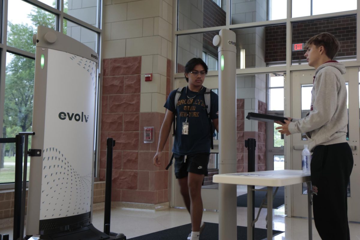 Students walk through the Evolv system as the come into school. Students are now required to go through Evolv bag checks before boarding the bus or vehicle when traveling for school trips.