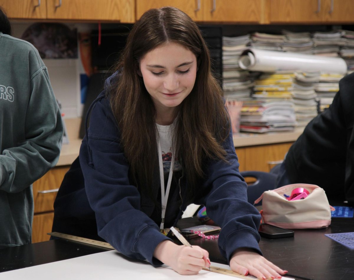 Izabelle Guerra, 10, attends medical society meeting after school Oct. 21.