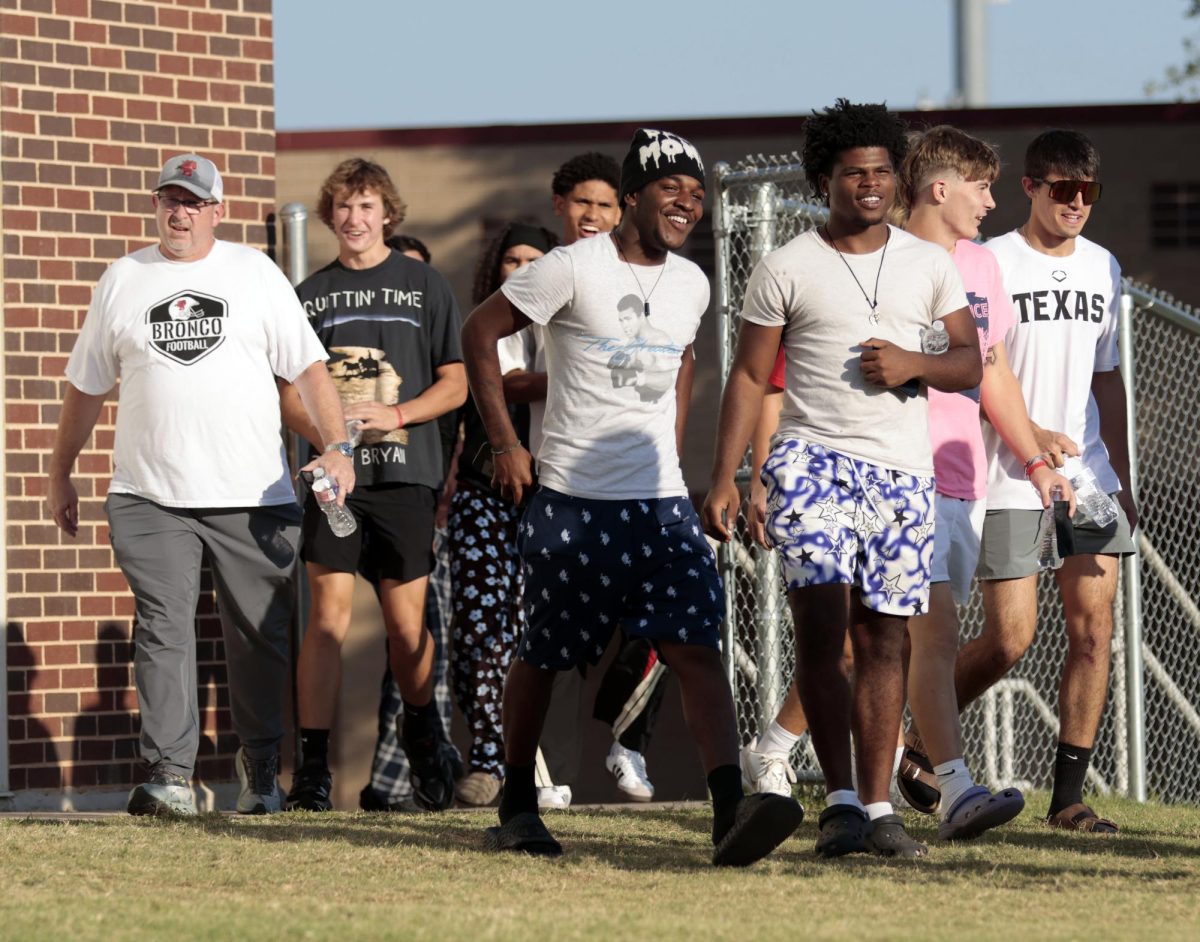 Varsity football players see their new tunnel for the first time after team dinner on Oct. 3.