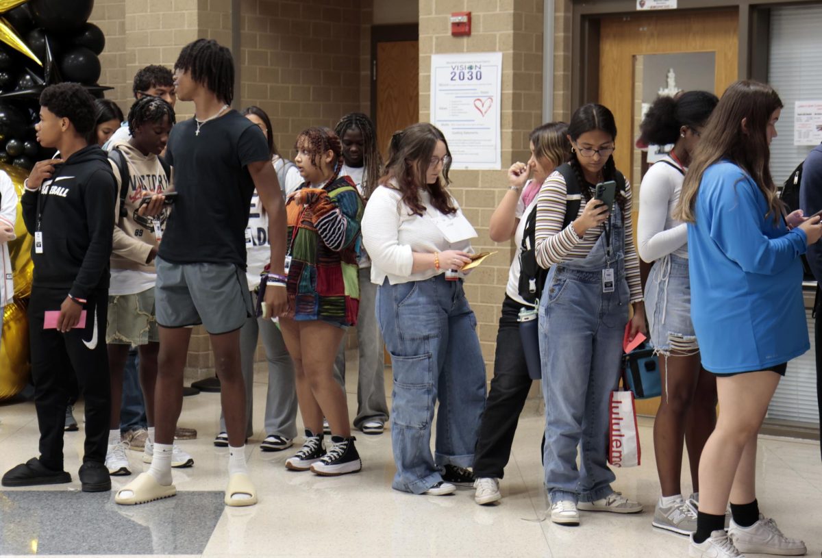 Students wait in line to buy the last 50 homecoming tickets during advisory on Oct. 2. Tickets sold out reaching maximum capacity of 800.