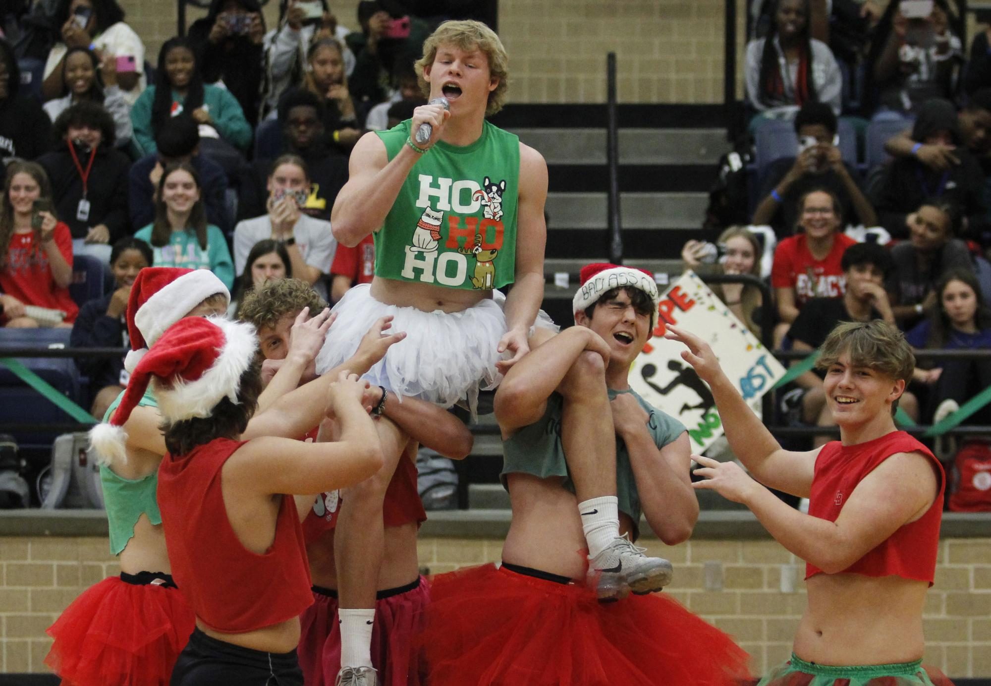 At the annual Key Club Toys for Tots pep rally, football and Key Club members perform a halftime dance.