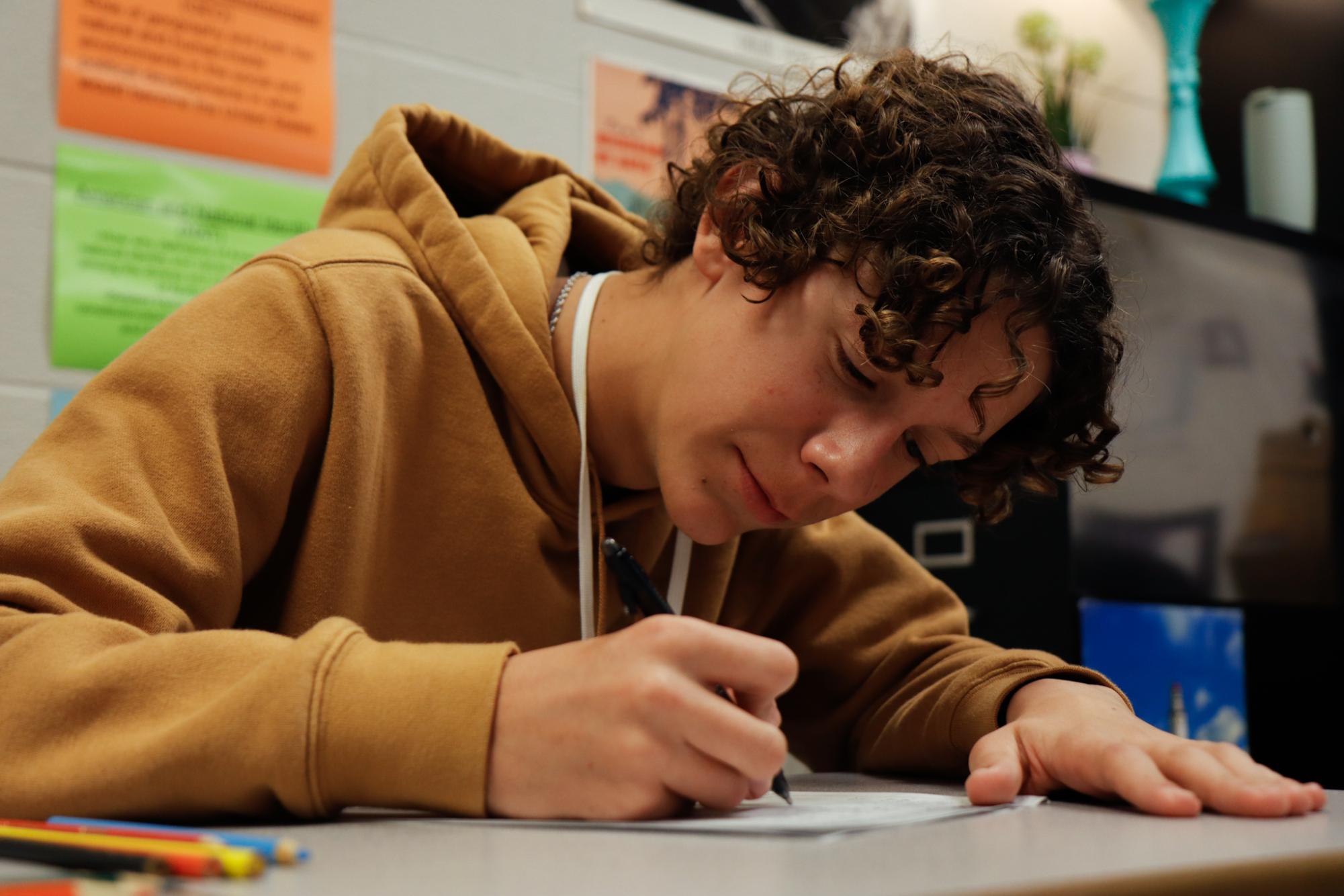 Junior Bowen Knox works on an assignment in AP U.S. History on Jan. 15. 