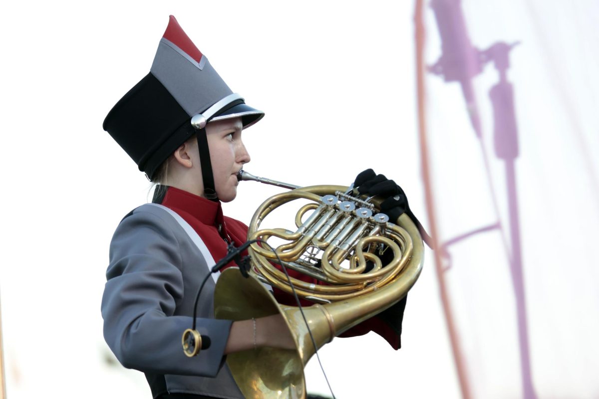 Sophomore Pipe Libscomb plays with marching band at the homecoming game against Weatherford on Oct. 4.