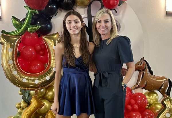 Dr. Cantu and Harper Cantu, 10, pose for a picture together.