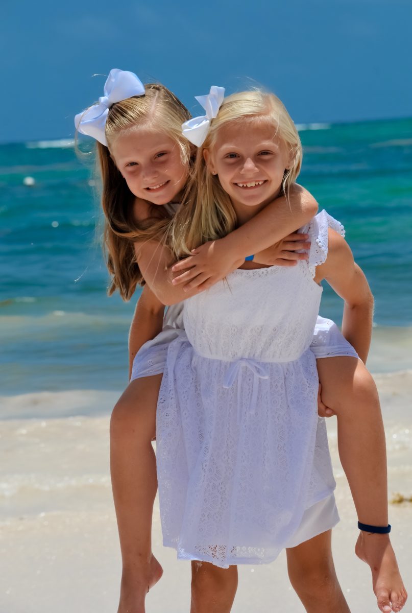 Claire Reed, 10, spends day at the beach with her sister.