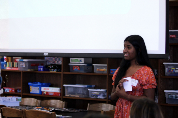 During the November NHS meeting, Legacy Alum Praisy Geevarghese speaks to the club about her Seeds to Harvest nonprofit organization. NHS meets every first Wednesday of the month.