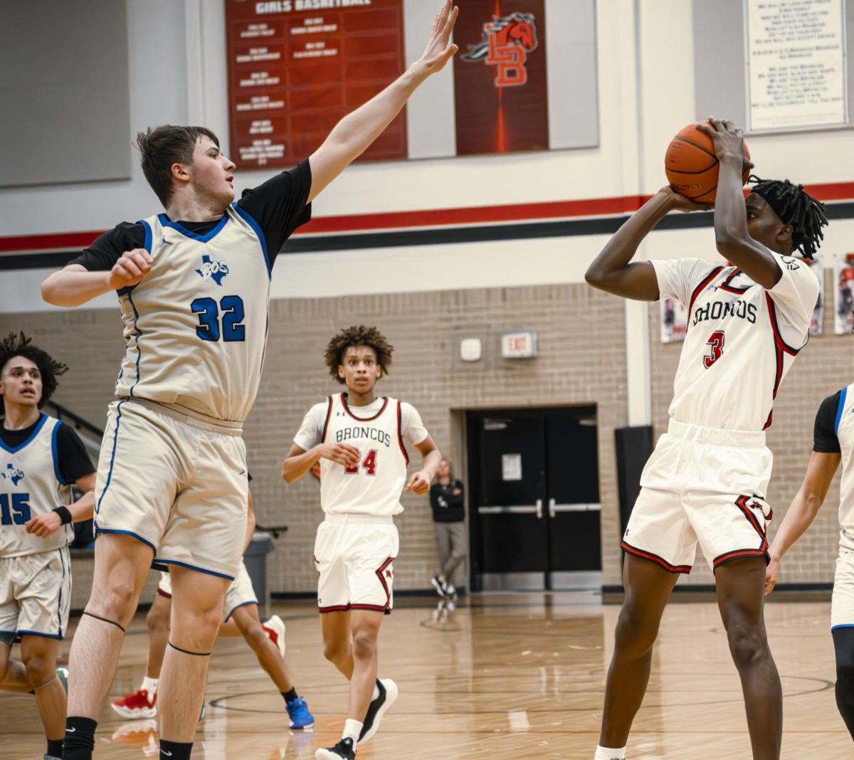 In the game against Boswell on Jan. 1, 2025, Jamerson Green, 12, shoots the ball in front of a Boswell player. 