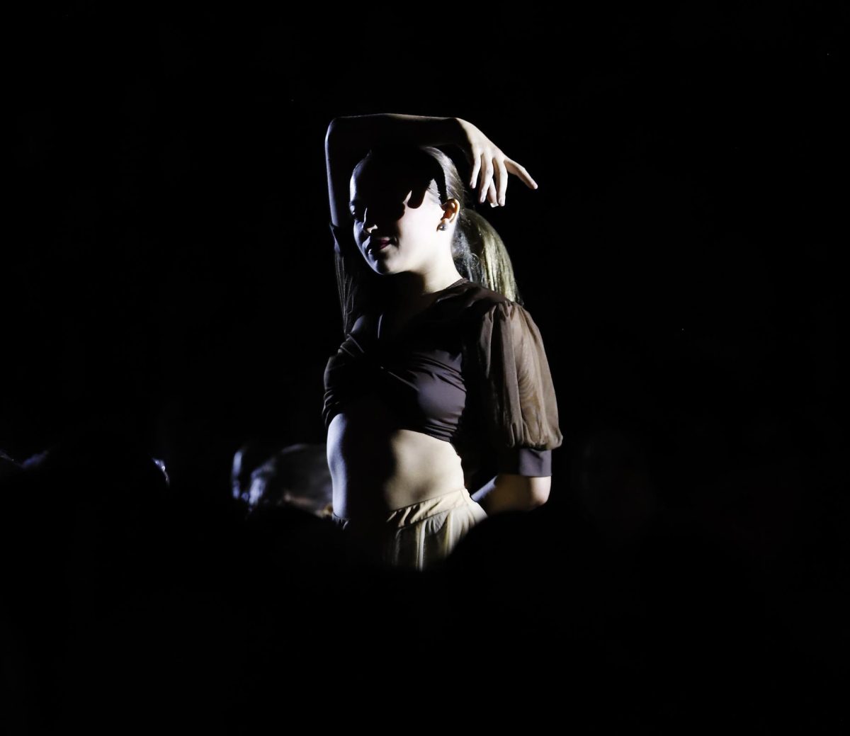 From the crowd:
To start the first performance after the intermission, Shayla Elam, 12, dances in the crowd to "Mary, Did You Know?" and works her way to the stage with the rest of the Silver Spurs.