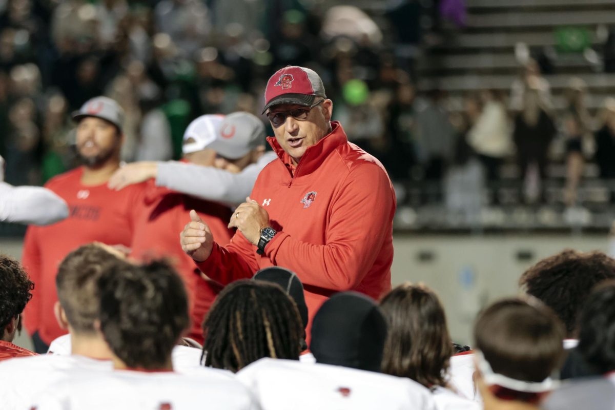 Coach Hulme talks to varsity after the playoff game against South Lake Carroll on Nov. 15, 2025.