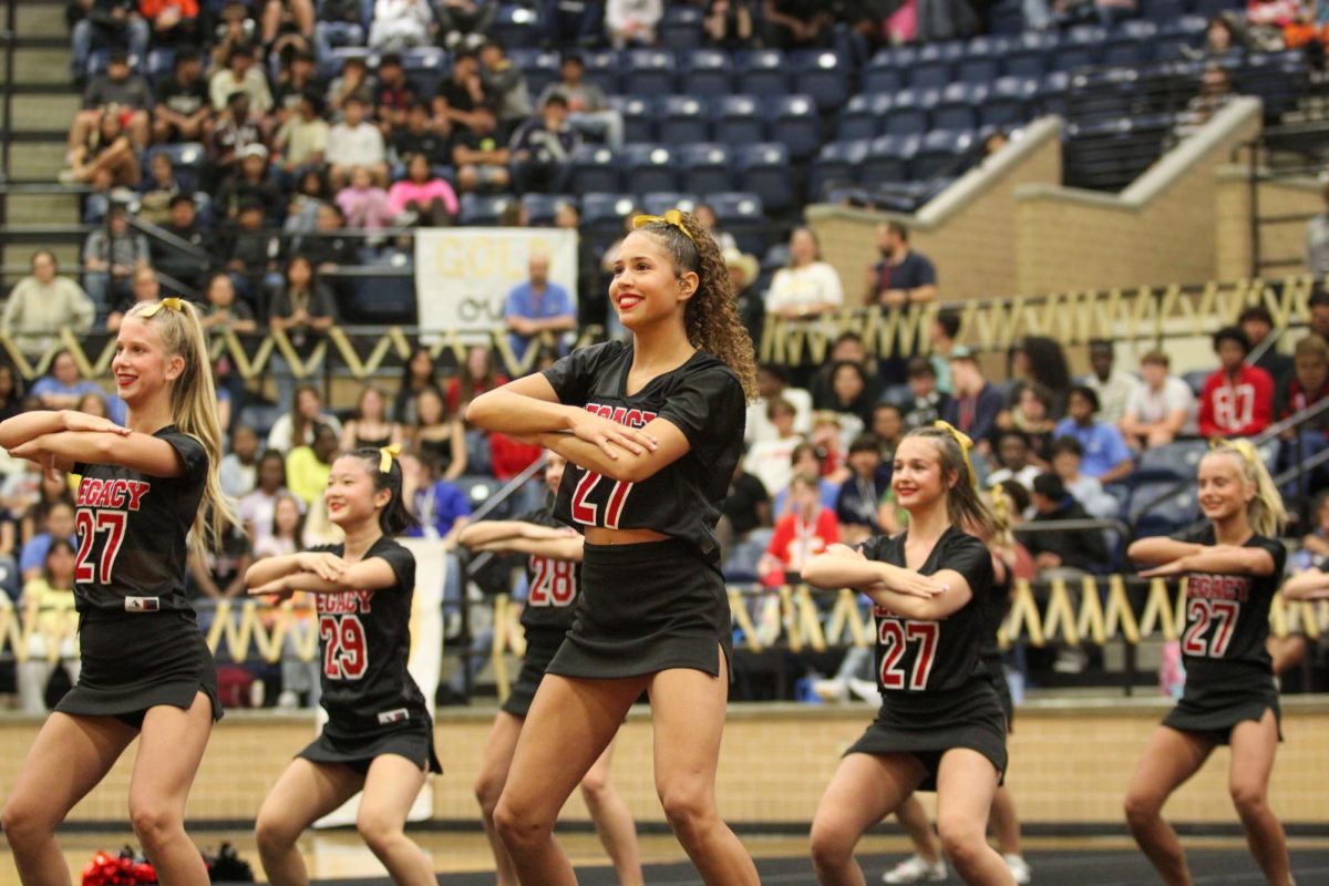 During the homecoming pep rally, Kamdyn Corwin dances to the music. Student Council hosted the homecoming pep rally on Oct. 24.
