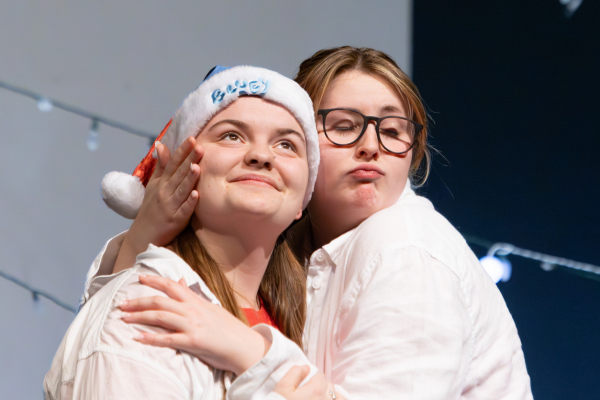 During the December Improv show, Emily Keating, 11, and Evelyn Dunn, 10, play the game "Freeze." Keating began doing Improv two years ago. 